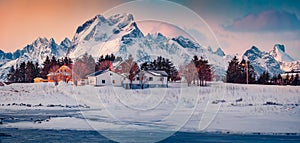 Frozen Torsfjorden fjord. Panoramic winter view of Fredvang village, Lofoten Islands, Norway