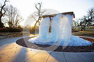 Frozen water fountain in Granbury, Texas during winter freeze