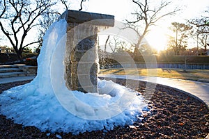 Frozen water fountain in Granbury, Texas during winter freeze