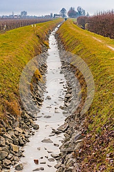 Frozen water of irrigation canal