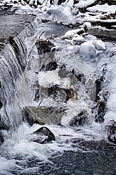 Frozen waterfall , ice patterns , winter waterfall