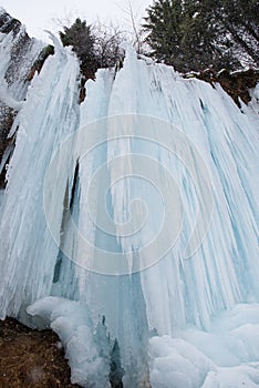 Frozen Waterfall. Layers of ice. Beautiful winter landscape in Romania.