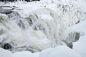 Frozen waterfall Tannforsen in winter, Sweden
