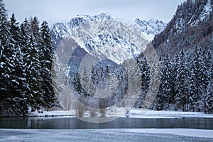 Frozen winter lake in the mountains