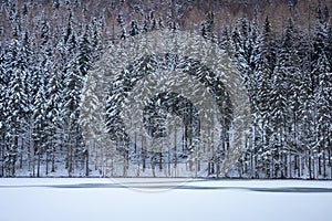 Frozen winter lake in the mountains