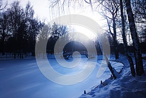 Frozen winter pond park background