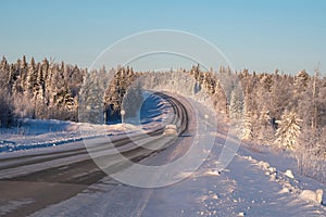 Frozen winter road. Winter landscape with a view of the road