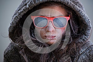 Frozen woman in sunglasses fashion portrait