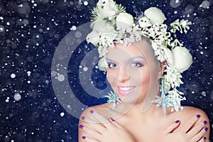 Frozen woman with tree hairstyle and makeup at Christmas, winter