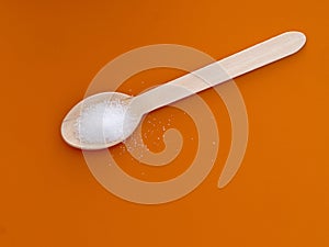 Fructose on spoon. Sugar substitute, replacement sweetener.