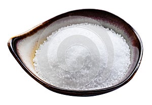 Fructose sugar sweetener in ceramic bowl isolated