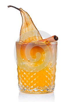 Fruit alcohol cocktail with pear and cinnamon stick isolated