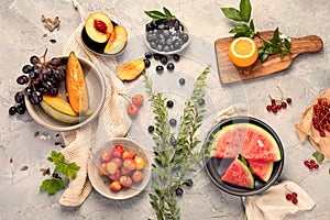 Fruit assortment served on light gray table