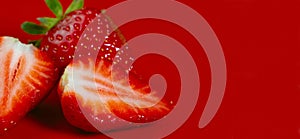 Fruit background. Strawberries on a red background.