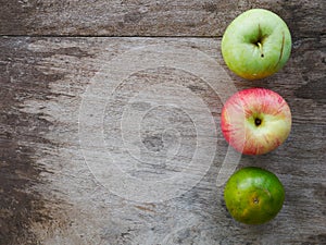 Fruit basket.organic healthy fruit on wood table photo