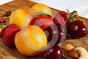 Fruit and berries on a cutting board proper food preparation home cooking foodphoto