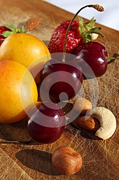 Fruit and berries on a cutting board proper food preparation home cooking foodphoto