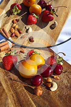 Fruit and berries on a cutting board proper food preparation home cooking foodphoto