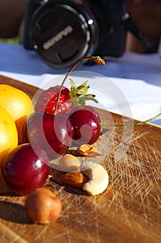 Fruit and berries on a cutting board proper food preparation home cooking foodphoto