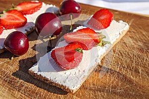 Fruit and berries on a cutting board proper food preparation home cooking foodphoto photo