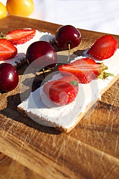 Fruit and berries on a cutting board proper food preparation home cooking foodphoto