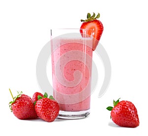 Fruit beverage with strawberries and milk. A glass full of fresh and bright red strawberries and organic milk. Pink smoothie .