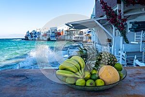 Fruit bowl on a table in Little Venice, Mykonos in summer