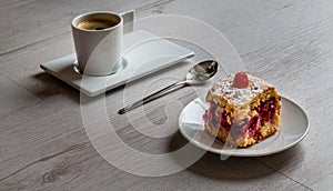 Fruit cake with a cup of espresso coffee