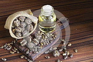 Fruit and castor oil on the wooden table