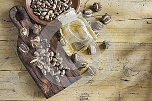 Fruit and castor oil on the wooden table