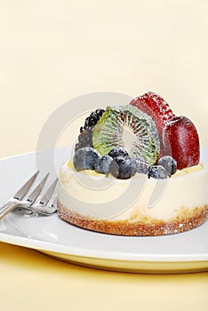 Fruit cheese cake with fork