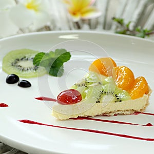 Fruit cheese pie on white dish
