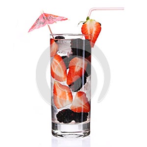 Fruit cocktail with Strawberry and Blackberry in the glass