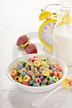 Fruit colorful sweet cereals in a bowl
