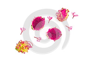 Fruit composition with dragon fruits and tropical flowers on white background. Flat lay, top view