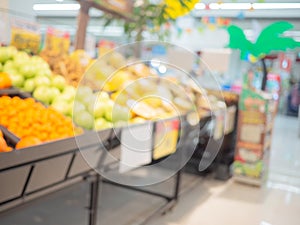 Fruit Department, Blurred shopping mall and retails store interior for background. photo