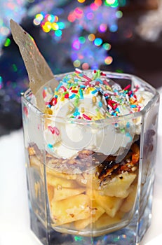 Fruit dessert with colorful sprinkles