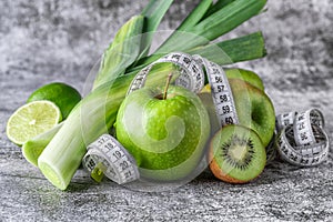 Fruit detox.Fresh green fruits vegetables on vintage background - concept for detoxification, diet or healthy food