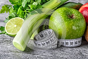 Fruit detox.Fresh green fruits vegetables on vintage background - concept for detoxification, diet or healthy food