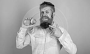 Fruit dieting. Join healthy lifestyle. Man with beard hipster hold apple fruit hand. Nutrition facts and health benefits