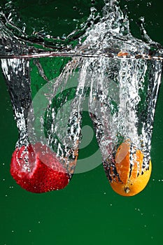 Fruit falling into water