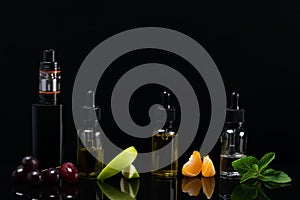 Fruit flavors in bottles for an electronic cigarette on a black background