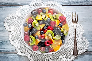 Fruit fresh mixed tropical fruit salad. Bowl of healthy fresh fruit salad - died and fitness concept