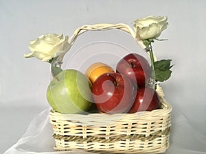 Fruit hampers with flower in the luxury basket photo