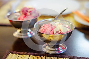 Fruit ice cream in metal bowls