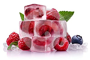 Fruit ice cubes with organic berries. Raspberry, blueberry and mint ice cubes isolated on white background. Fruit ice commercial