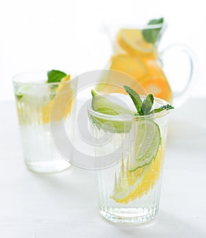 Fruit infused citrus drink in a jug or mug at a cafe