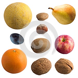 Fruit isolated on a white background. Melon; pear; apple and orange, Kiwi; plum; walnut; almonds; hazelnuts.