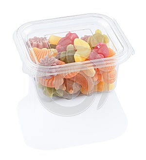 Fruit jellies marmalade in a plastic food box photo