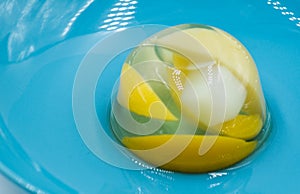 Fruit jelly mix on a blue plate